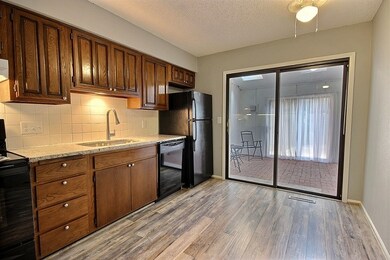 Kitchen looking out to sunroom