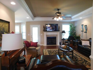 GREAT ROOM WITH GAS FIREPLACE AND A LOT OF NATURAL LIGHT