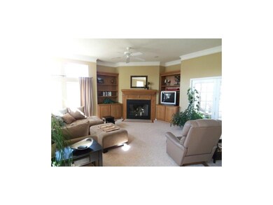 Cozy family room. Note the fireplace and built ins