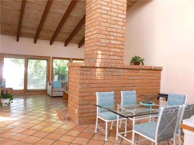 Separate formal dining area, soaring beamed ceilin