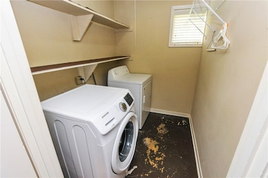 Clothes washing area with washer and dryer
