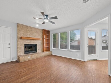 Unfurnished living room with a textured ceiling, 