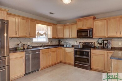 Beautiful kitchen with Stainless Steel appliances,