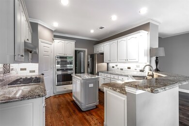 Kitchen featuring appliances with stainless steel 