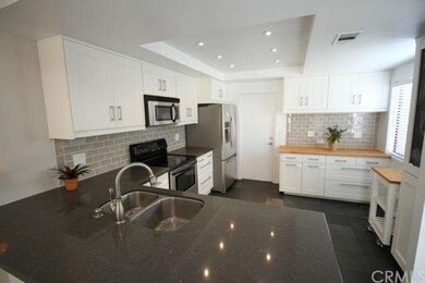 Upgraded Caesarstone Quartz Countertop, Tile full-