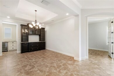 Dry Bar / Butlers Pantry serving area directly adj