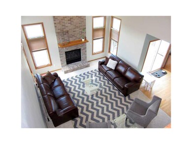 Great Room. 2 story great room with brick fireplac