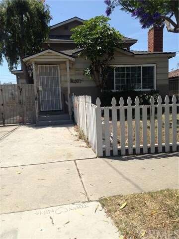 1218 D St. nice front yard and all new dual pane w