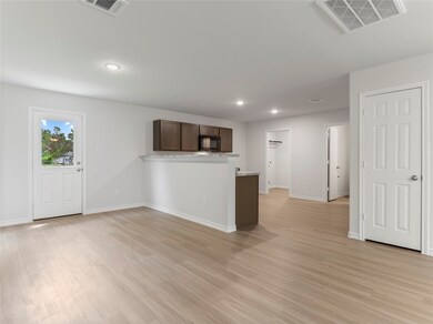 Open dining area seamlessly connected to the kitch