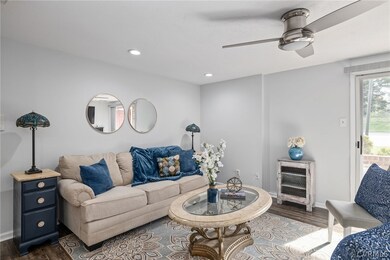 Living room featuring dark hardwood / wood-style f