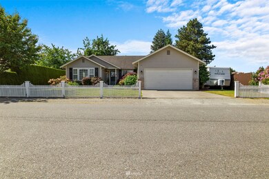 Note the RV spot on the side yard. Fence in front will swing open so you can pull straight out.