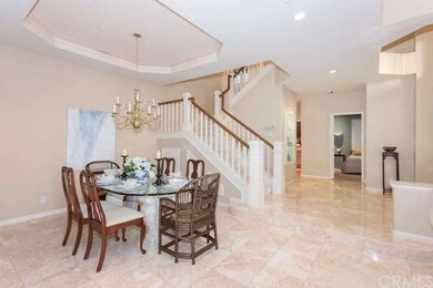 Formal living room with marble flooring and recess