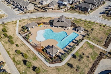 Aerial view of residential area with a pool