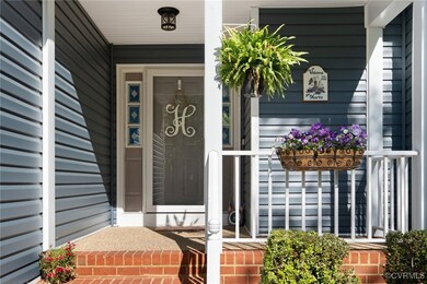 Doorway to property with a porch