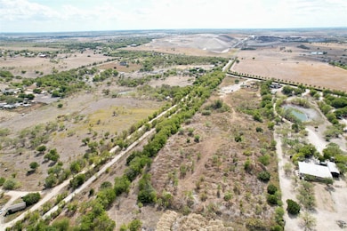 Aerial view of property's location with rural lan