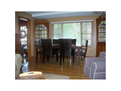 Dining area with built-in china cabinets & hard wo