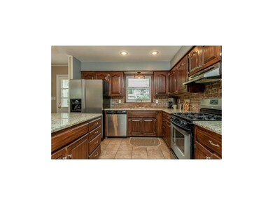 LOADS of GRANITE Counter Space and easy backyard a