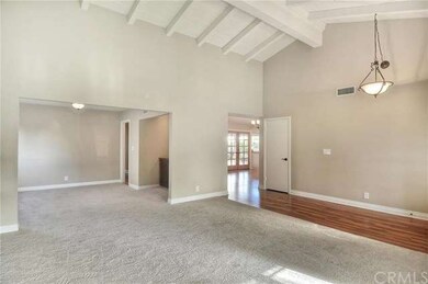 Vaulted Ceilings and Living room upon Entry with D