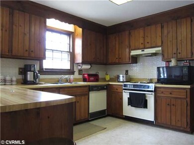 Kitchen - Large kitchen with new flooring, built i