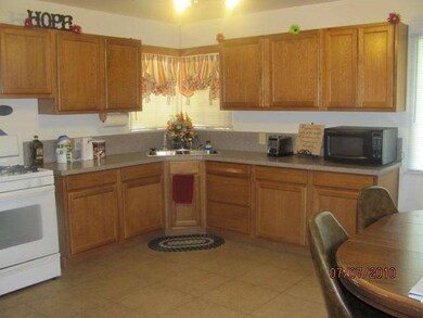 Kitchen with a sink to look out from