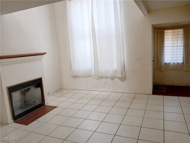 Unfurnished living room featuring a fireplace with