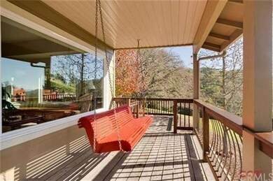 Serenity is the mood of the covered porch...the pe