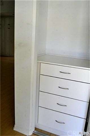 the entry closet has built-in drawers