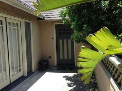 PRIVATE FRONT PORCH WITH FRONT DOOR TO LIVING ROOM