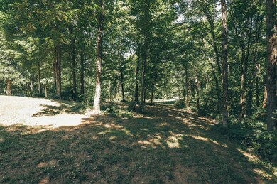 Home is nestled in the middle of 22 acres of woods. No sounds of traffic or your neighbors—just peaceful serenity.