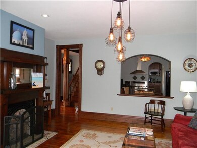 Spacious living room that looks into the kitchen. 