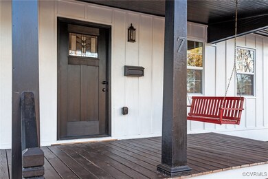 Entrance to property with covered porch