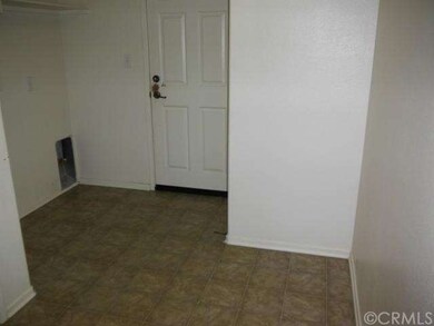 Laundry Room downstairs with extra space for storage and access to garage