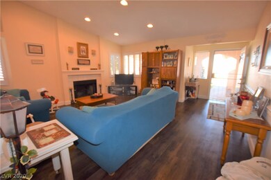 FRONT LIVING ROOM WITH WOOD BURNING FIREPLACE