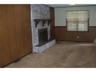 Downstairs wood burning fireplace