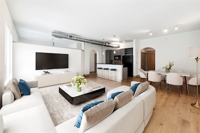 The open concept living space is thoughtfully desi