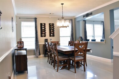 This huge dining room could accommodate a table that seats even more than eight!