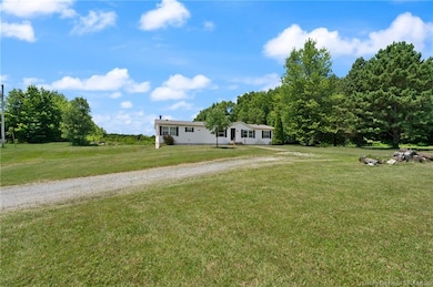 Spacious front yard perfect for outdoor activities and future landscaping ideas.