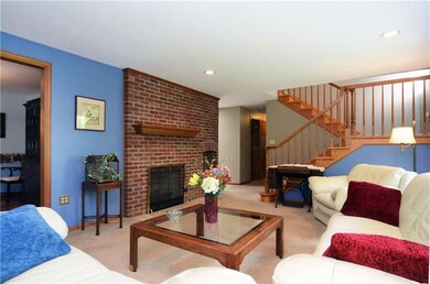 GATHER AROUND WOOD BURNING FIREPLACE