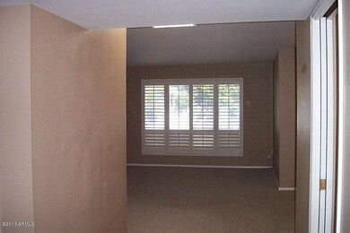 LARGE LIVING ROOM  W/SHUTTERS