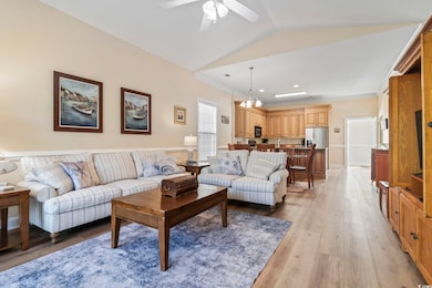 Living area featuring light wood finished floors, 
