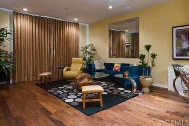 Living Room with Harwood Floors, Custom Drapes and