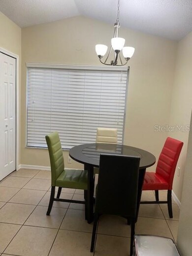 Eating area in the kitchen. Large pantry to the le