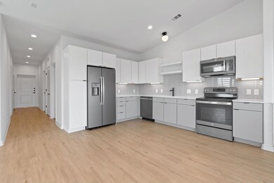 Kitchen featuring appliances with stainless steel