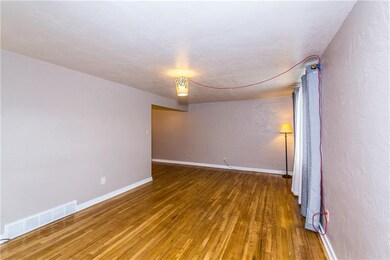 Living room 20x11 freshly painted with hardwood fl