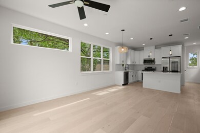Kitchen featuring appliances with stainless steel