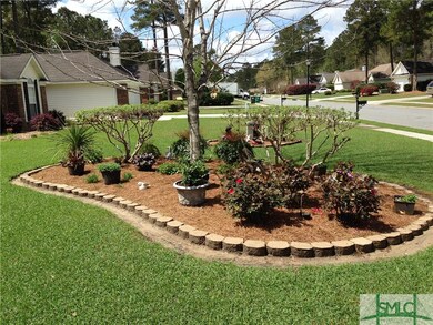 Lovely planter in the front yard is sure to deligh