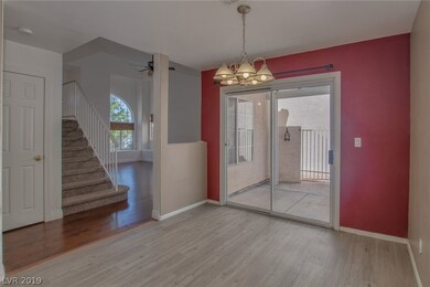 Eating area in kitchen with slider to backyard