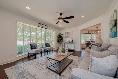 A bright, spacious living room with large windows