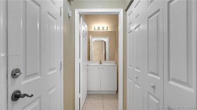 Half Bathroom downstairs, garage entrance and laun