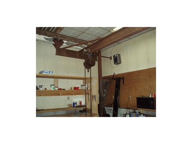 Lift-crane runs the width of the building (30 ft).
